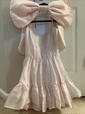 Dolls Kill Baby Pink Tiered Mini Party Dress with Bow Detail